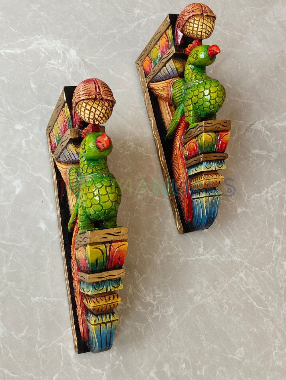 green colour parrots standing on entrance